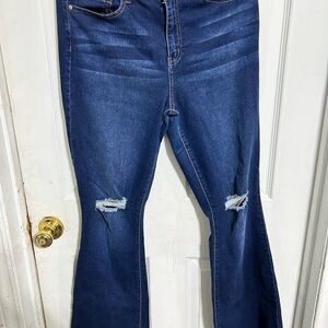 Blue Boot Cut Jeans with Distressed Knees and High Waist